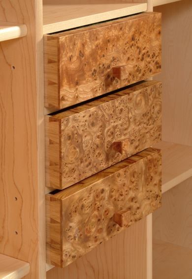three wooden drawers 