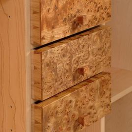 three wooden drawers 